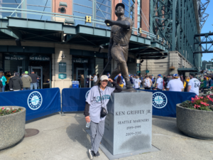 2023-09-30 Sheli hanging out with a Ken Griffey Jr statue