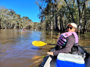 Sheli on the bayou (without her life jacket bucked up! 👎🏽)