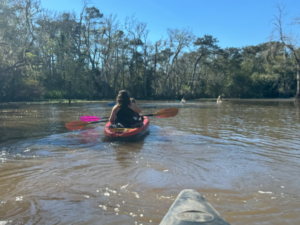 Tanya & B kayaking ahead of us